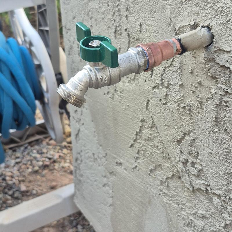 Outdoor hose bib with green ball valve handle