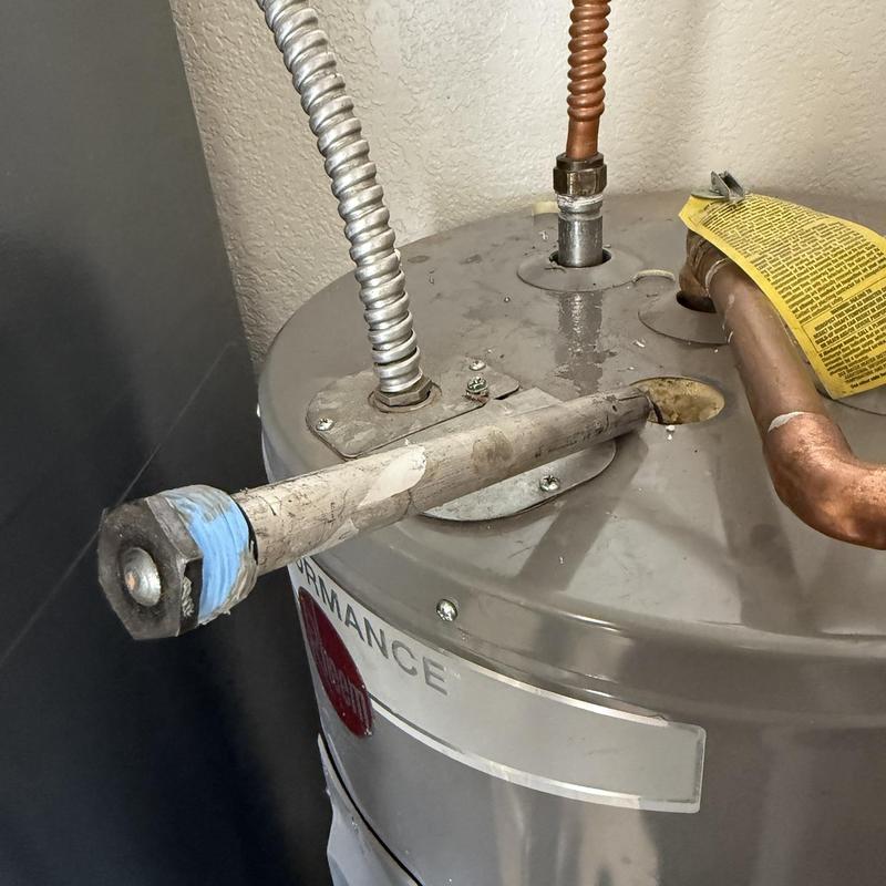 Tank water heater gas control valve and piping connections