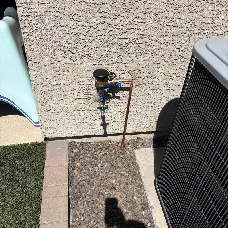 Pressure vacuum breaker on outdoor hose bib installation