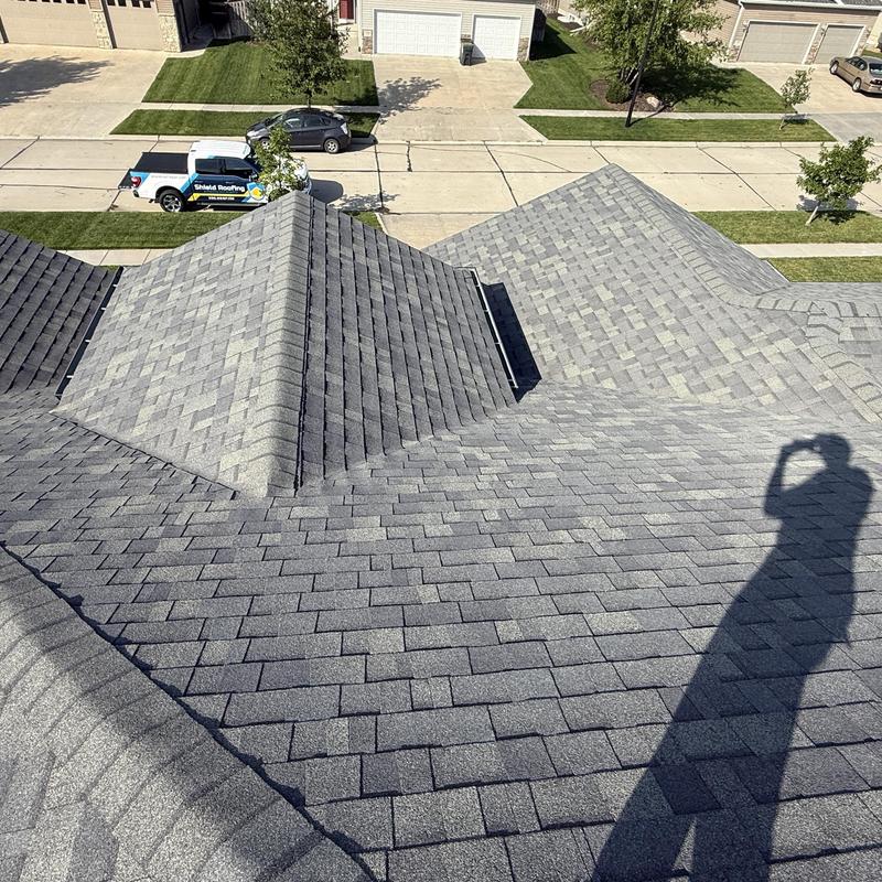 Roof shingles near vent with under-driven nails issue Roof shingles near vent with under-driven nails issue