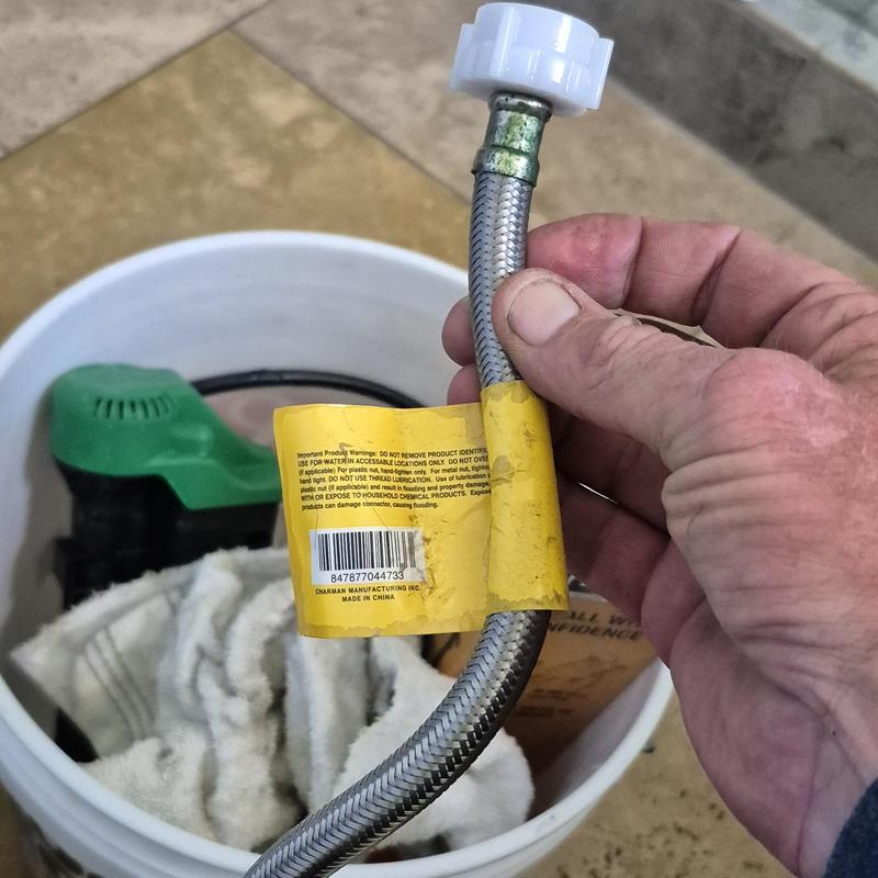 Toilet water supply line with corrosion buildup