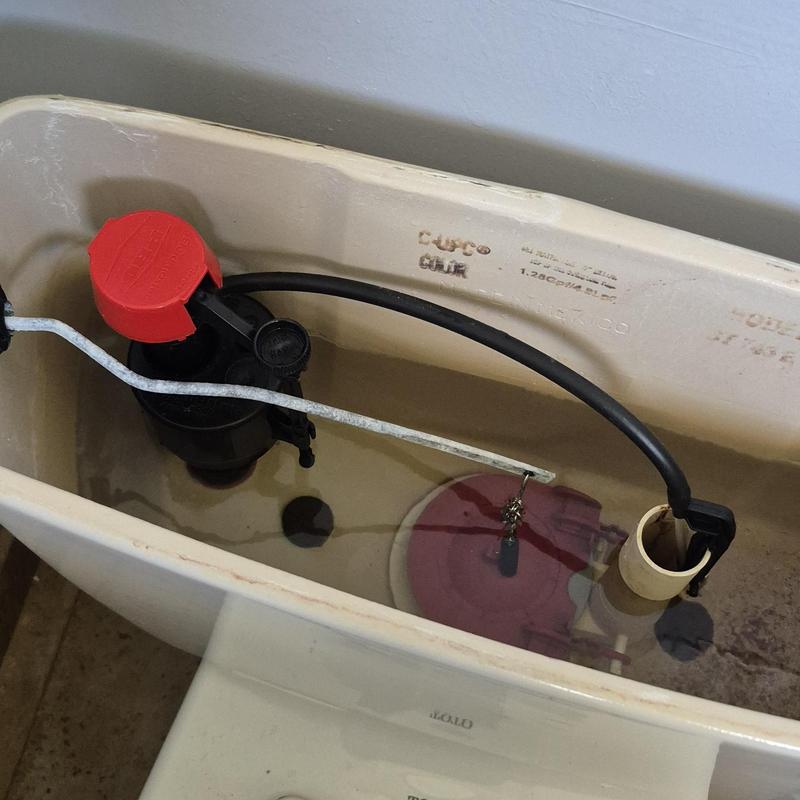 Toilet tank internal flush valve and fill valve assembly