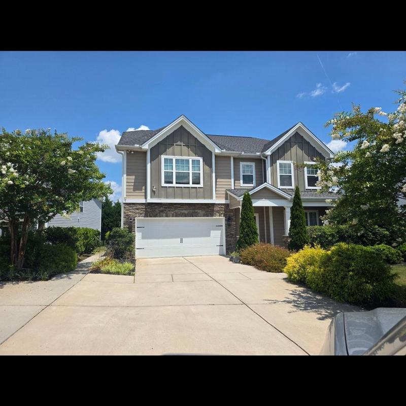 Roof shingles and boots inspection at suburban home