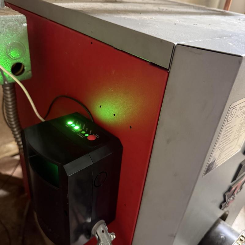Boiler control panel with indicator lights lit