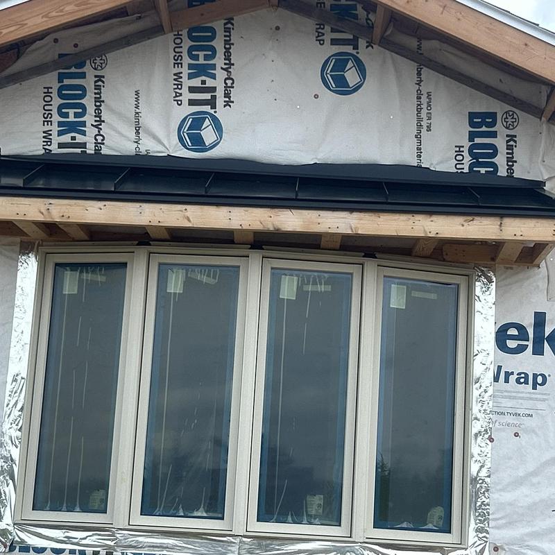 Window installation with house wrap and drip edge Window installation with house wrap and drip edge