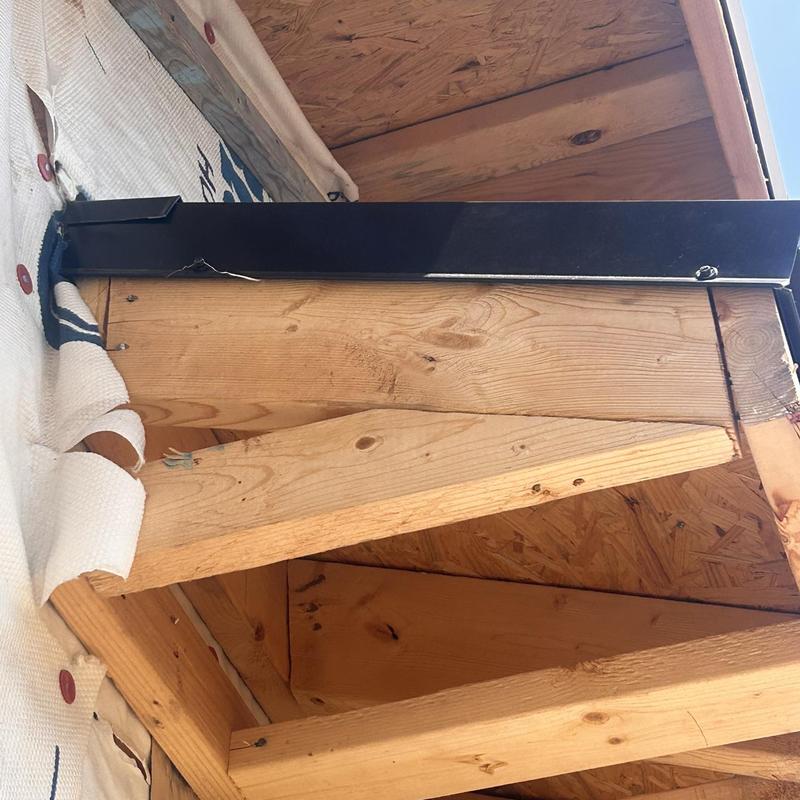 Standing seam roofing edge flashing on wooden roof frame Standing seam roofing edge flashing on wooden roof frame