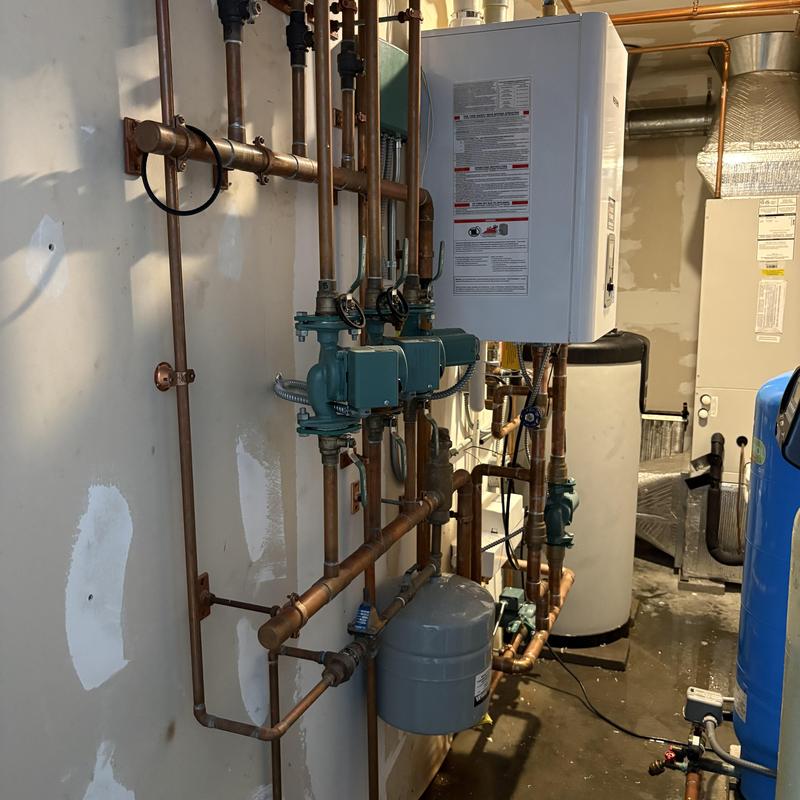 Triangle boiler with copper piping and expansion tank