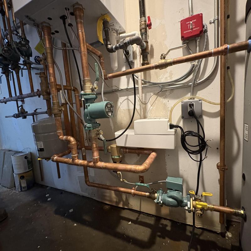 Triangle tube boiler piping and circulator pump installation