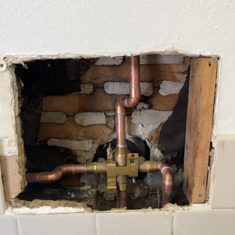 Delta shower valve with copper piping installation in wall Delta shower valve with copper piping installation in wall