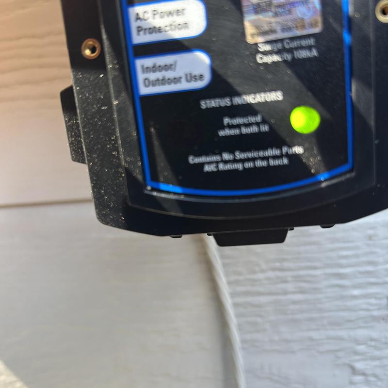 Whole home surge protector installation status light Whole home surge protector installation status light