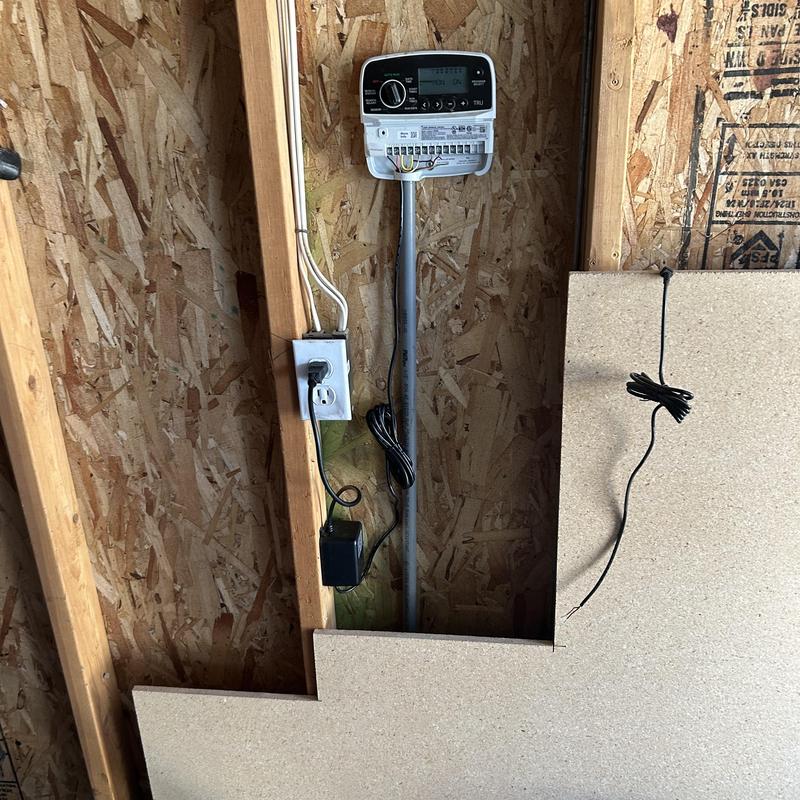 Sprinkler system timer and electrical receptacle installation Sprinkler system timer and electrical receptacle installation