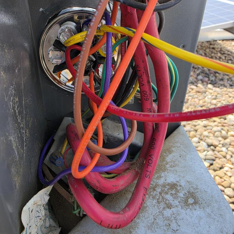 Voltage absorption capacitor and disconnect fuses wiring