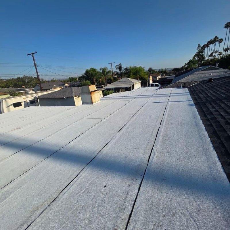 Flat roof with new white membrane installation Flat roof with new white membrane installation