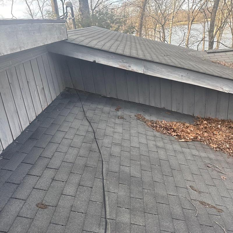 Asphalt shingle roof and eaves inspection in winter