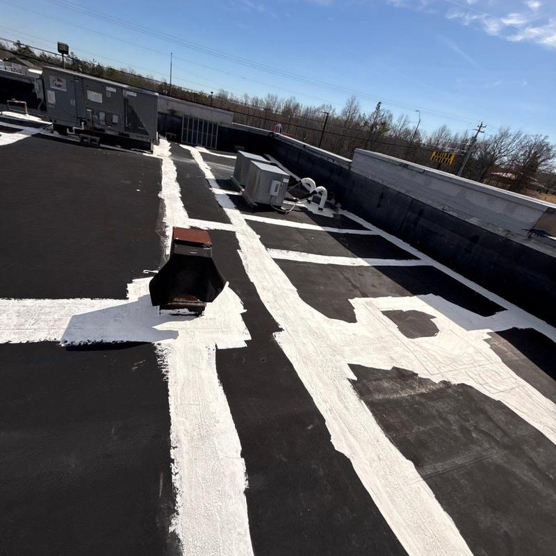 Commercial roof flashing with waterproof sealant application