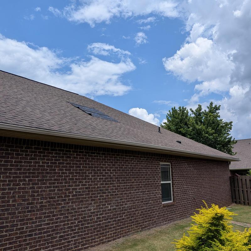 Roof shingles temporary patch on residential house in Madison