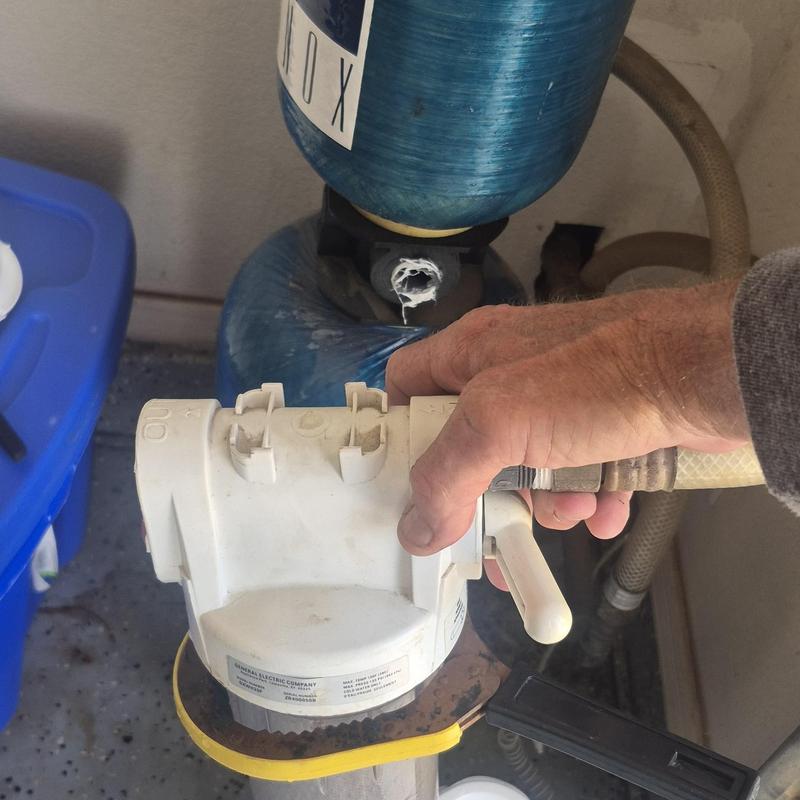 Bypass filter valve and cartridge in garage system