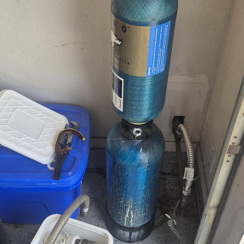 Bypass water filter system with tools in garage