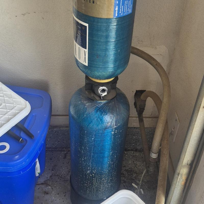 Bypass water filter system with damaged valve in garage
