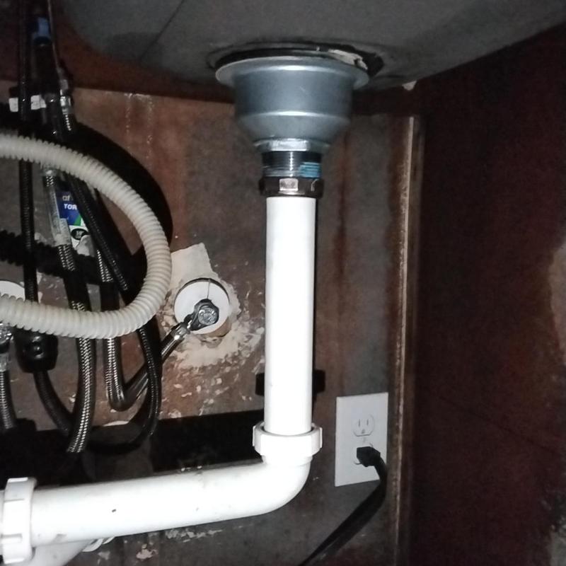 Basket strainer and drain pipe under sink installation