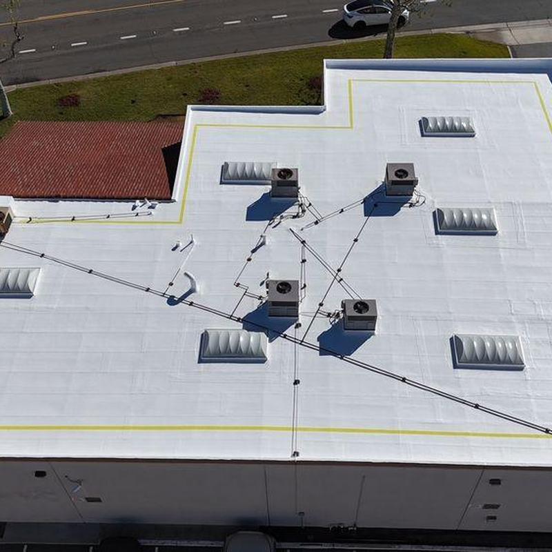 TPO commercial roof with HVAC units and vents TPO commercial roof with HVAC units and vents