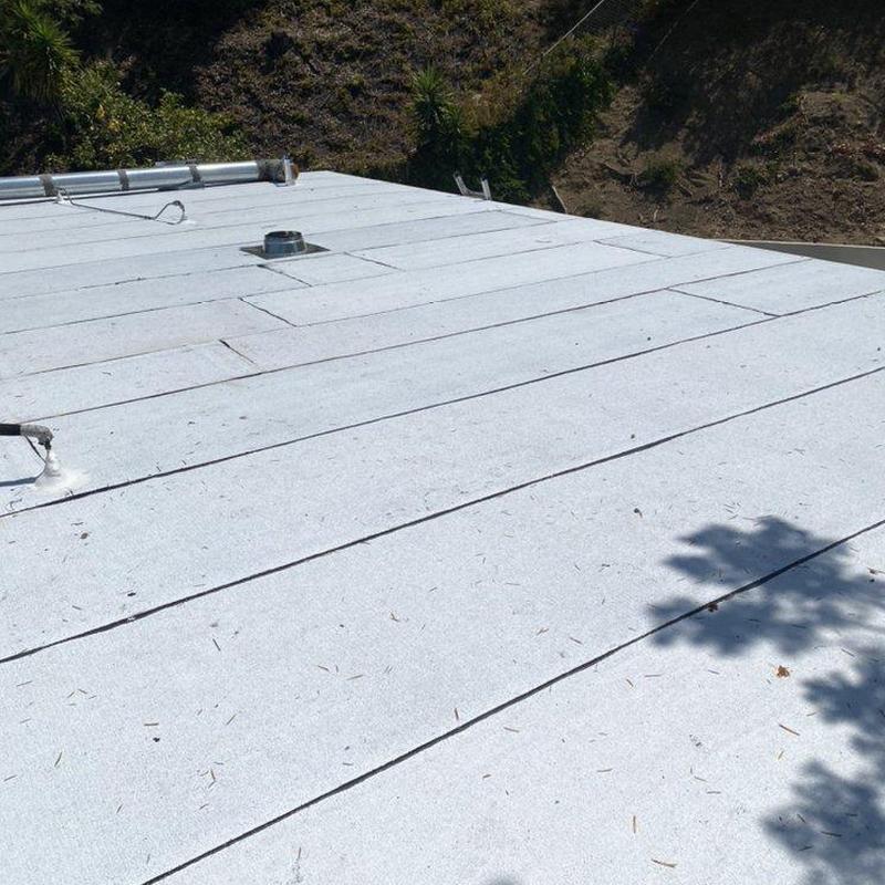 Flat roof surface with sealed seams inspection Flat roof surface with sealed seams inspection