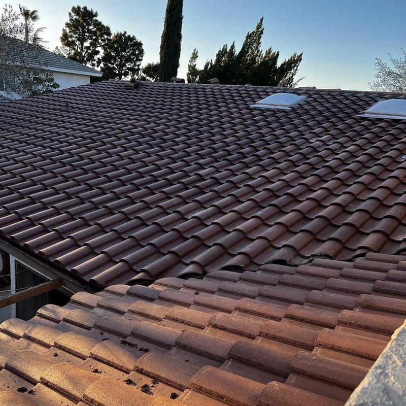 Tile roof surface with skylights during inspection Tile roof surface with skylights during inspection
