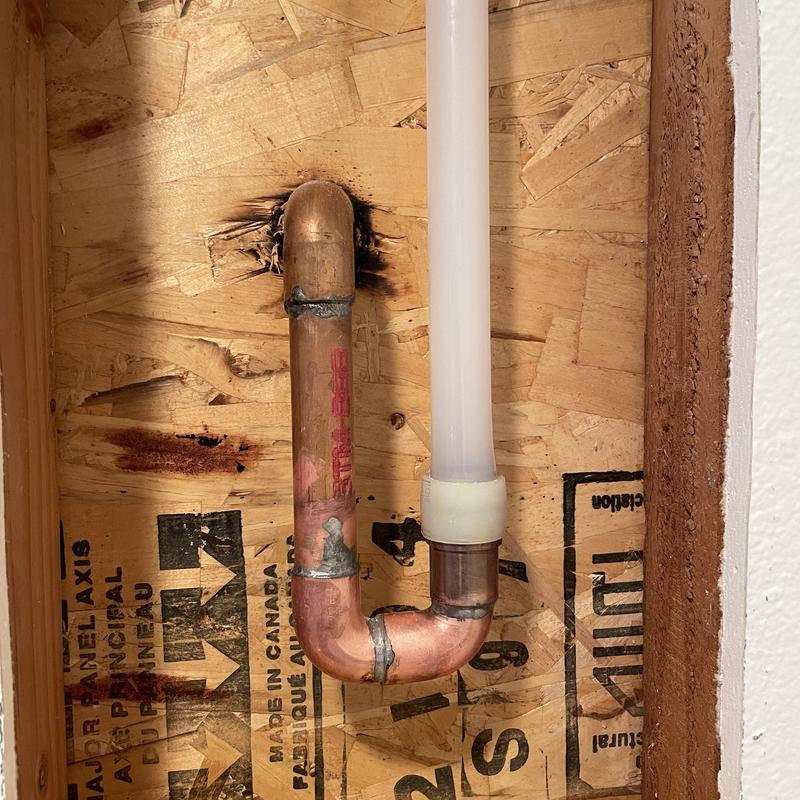 Type A PEX hot water line with copper fittings