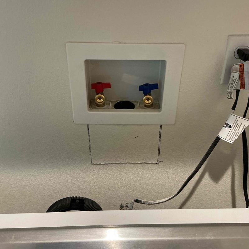 Laundry valves with drywall cutout below