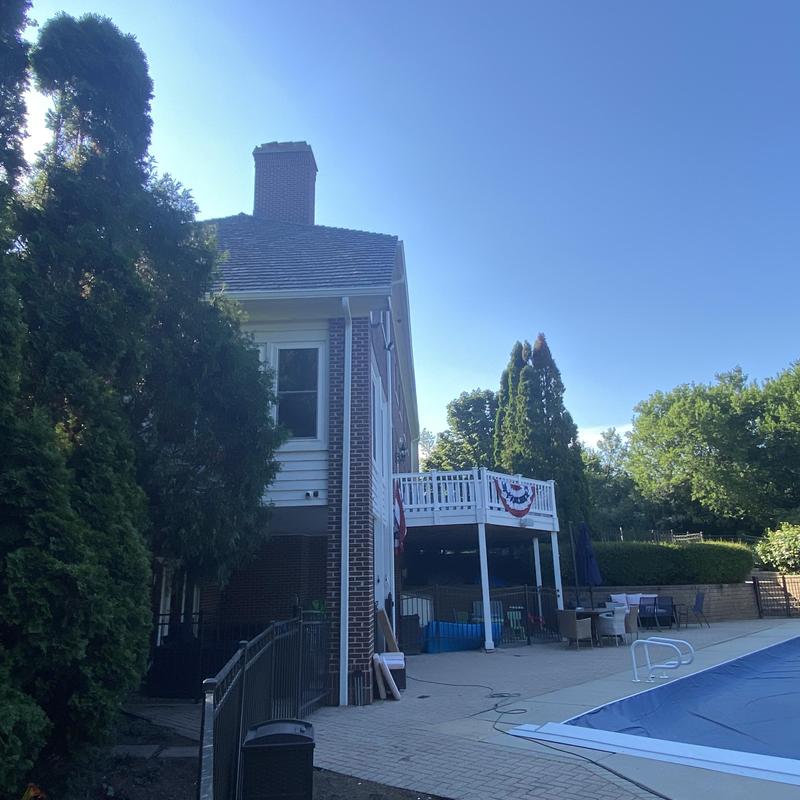 Oversized gutters and downspouts with guards installation