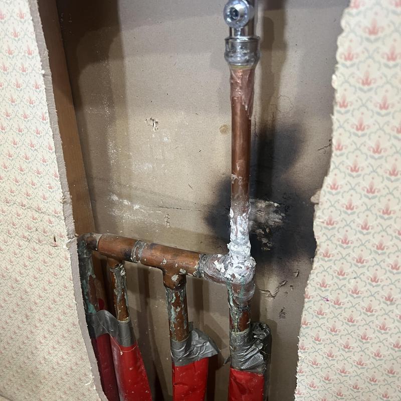 Copper plumbing pipe leak repair behind drywall