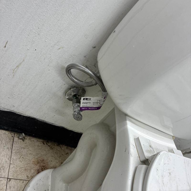 Toilet valve and flexible supply line installation near tank Toilet valve and flexible supply line installation near tank