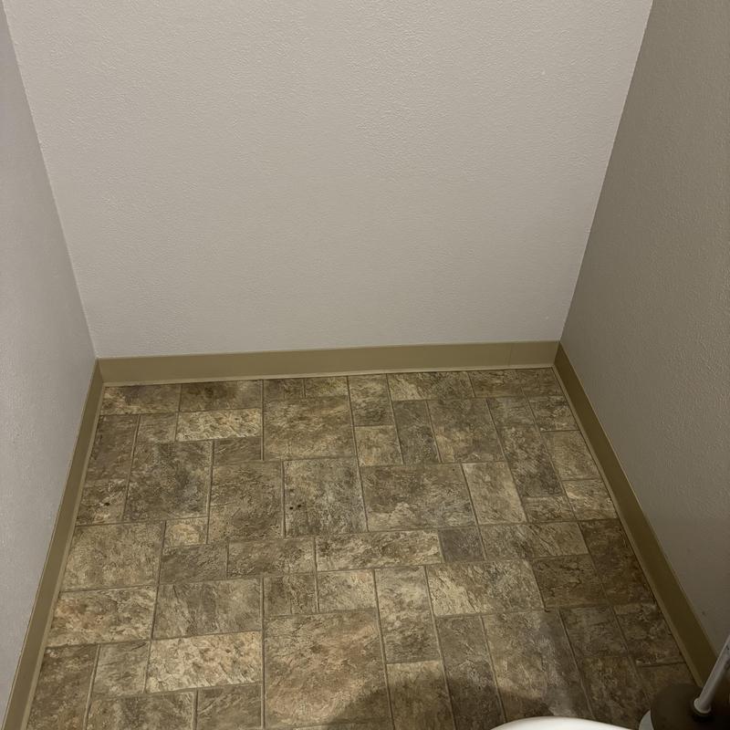 Basement bathroom shower installation space with tile floor Basement bathroom shower installation space with tile floor