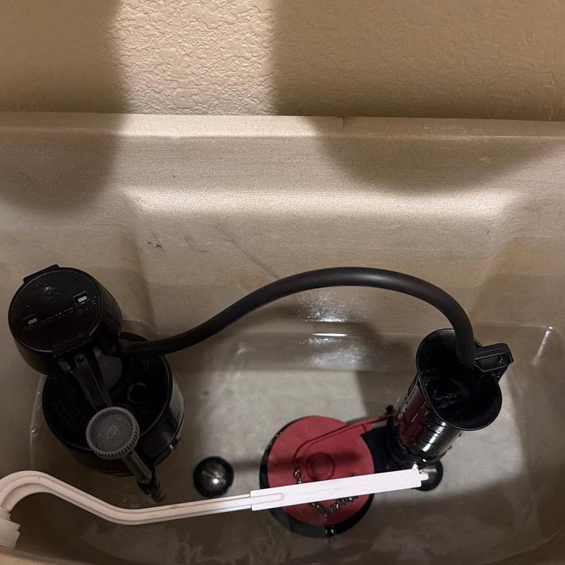 Toilet fill valve and flush valve assembly inside tank Toilet fill valve and flush valve assembly inside tank