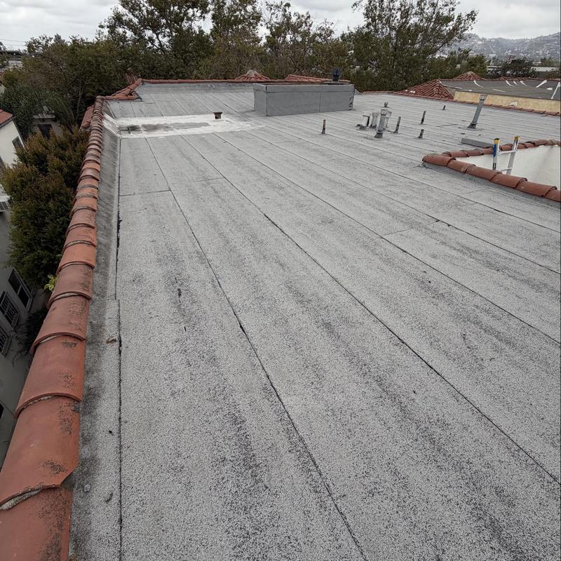 Torch down roofing flat roof inspection with vents Torch down roofing flat roof inspection with vents