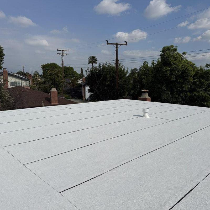 Flat roofing system with white coating in Monrovia Flat roofing system with white coating in Monrovia