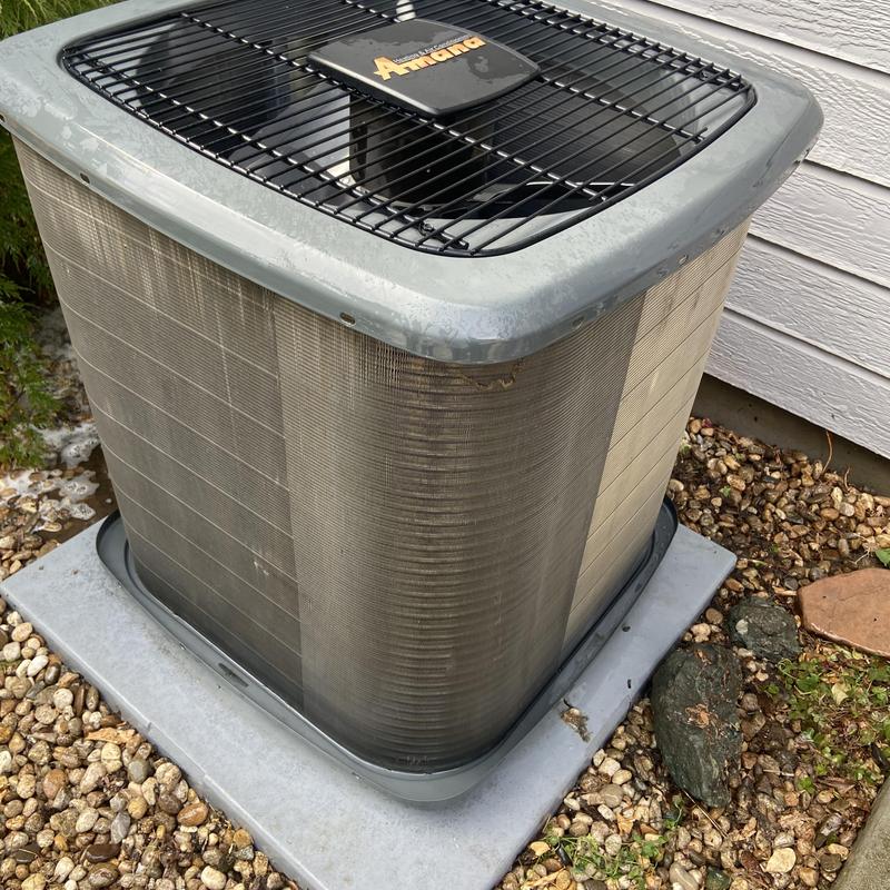 Condenser coil on dirty Air Conditioning unit outdoors Condenser coil on dirty Air Conditioning unit outdoors