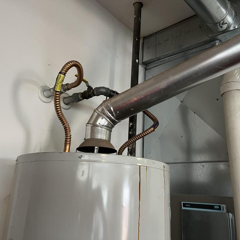 Gas water heater vent pipe and gas lines installation Gas water heater vent pipe and gas lines installation