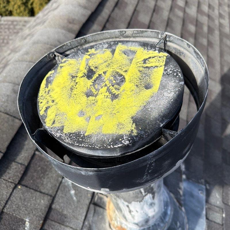 Roof vent cap with hail damage marked on top