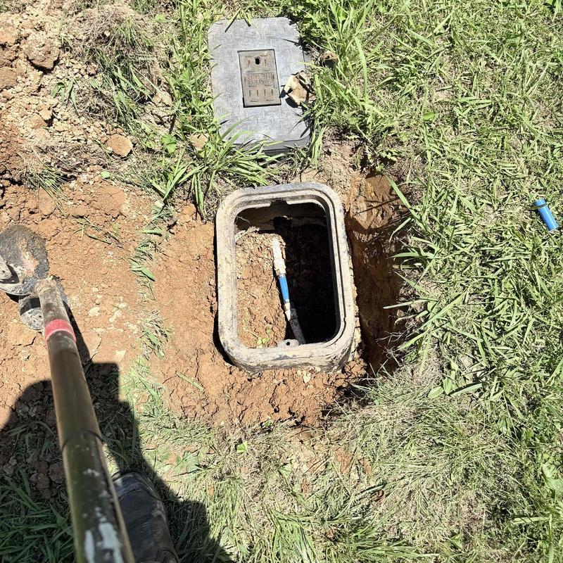 Pressure reducing valve box with exposed pipe in yard Pressure reducing valve box with exposed pipe in yard