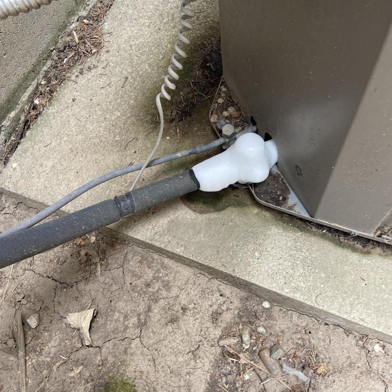 Air conditioner condensate drain pipe with ice buildup Air conditioner condensate drain pipe with ice buildup