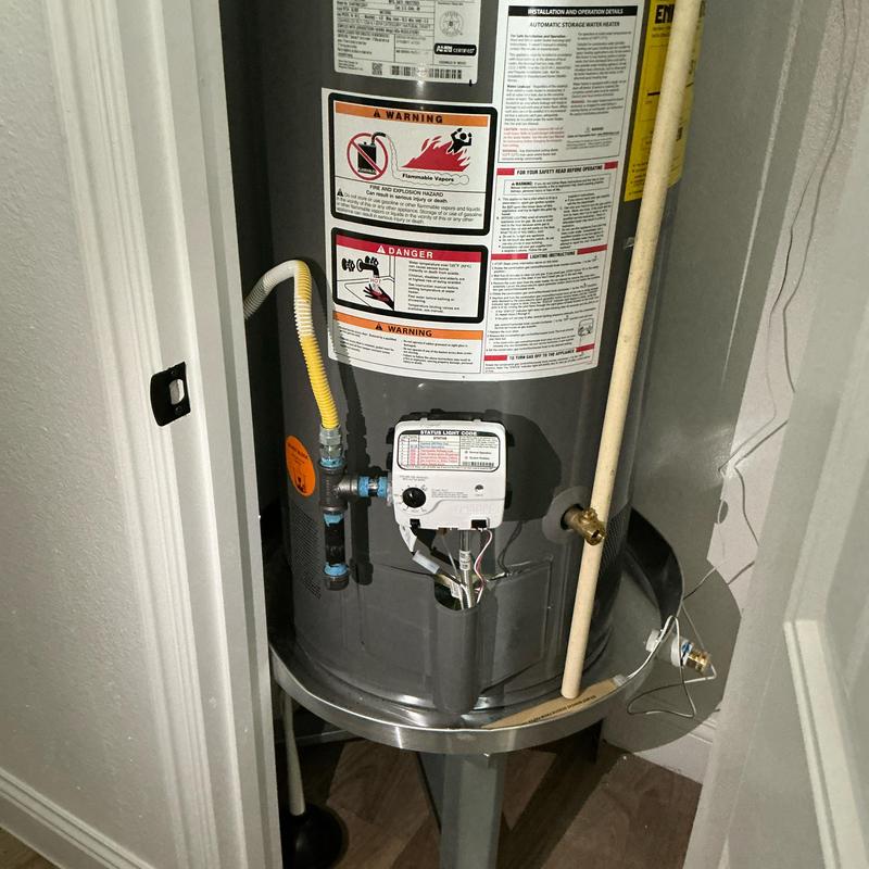 Water heater with sediment trap and expansion tank installed Water heater with sediment trap and expansion tank installed
