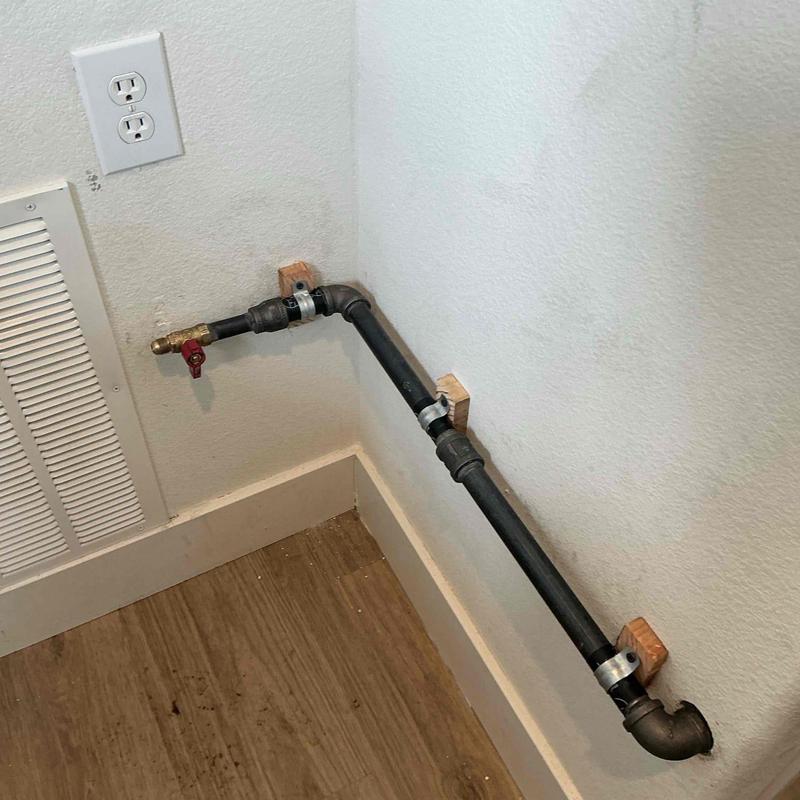 34-inch black iron gas piping with valve and clamps