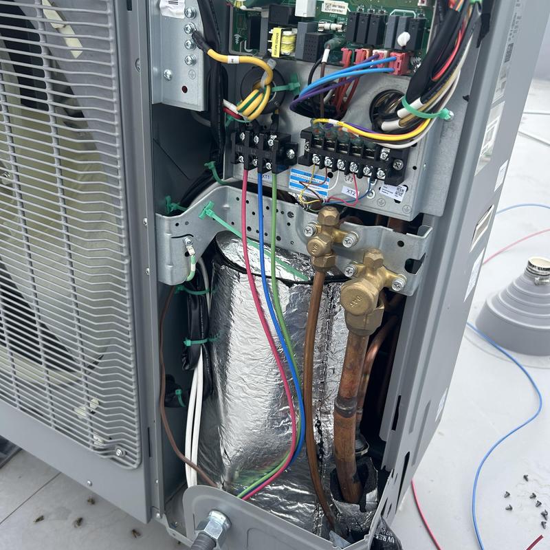 Air-conditioning unit wiring and copper piping connection