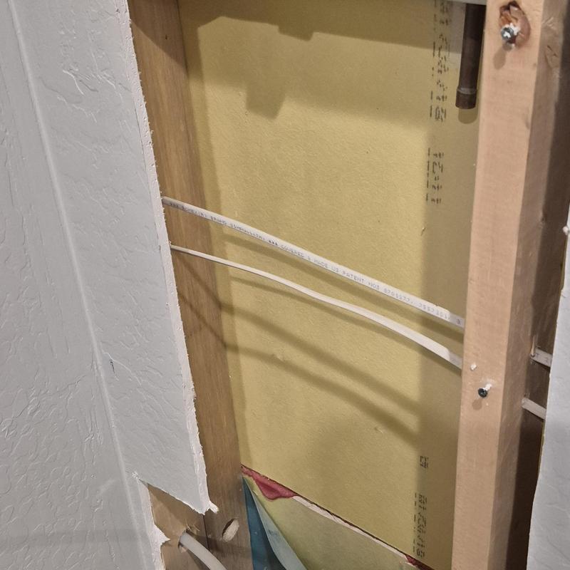 Sink water supply lines in closet wall cavity