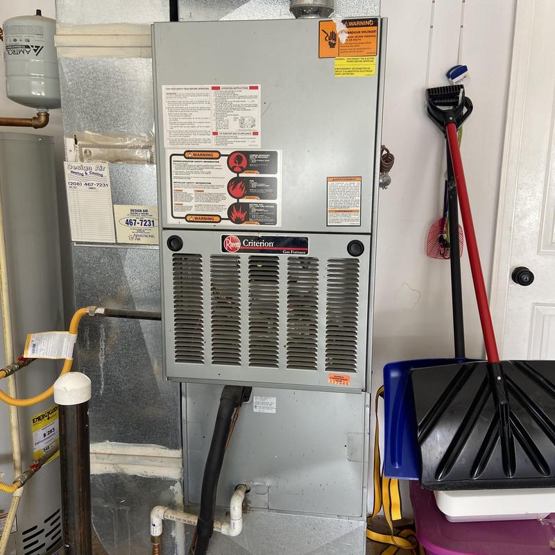 Gas furnace unit with connected ductwork and piping
