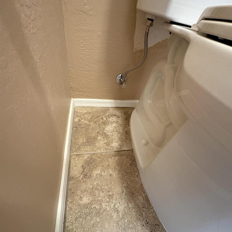 Toilet water supply line with quarter turn angle stop