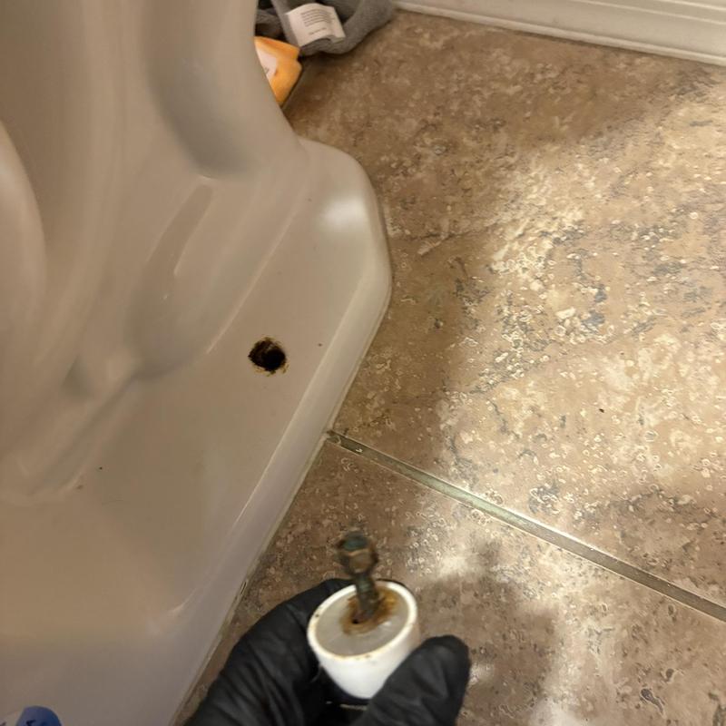 Toilet mounting bolt removal on tiled floor