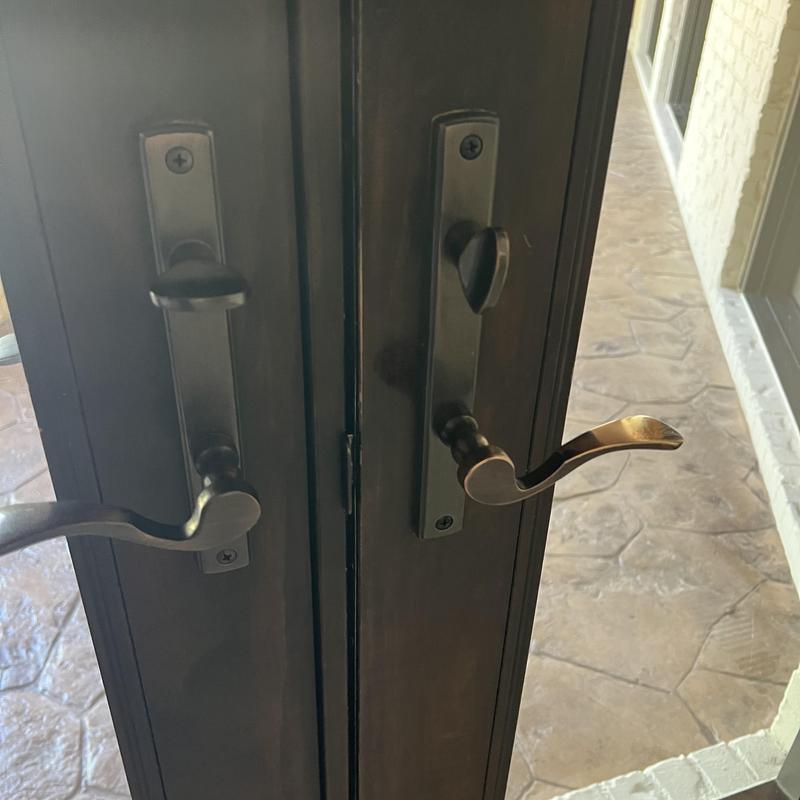 Exterior door lever handles with thumb turn locks