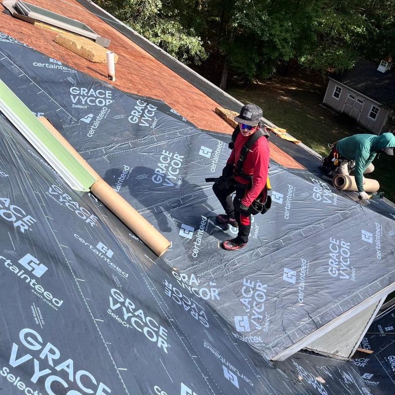 Roof underlayment installation on steep residential roof